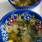 two ceramic blue dipping saucers with api-li-mojili